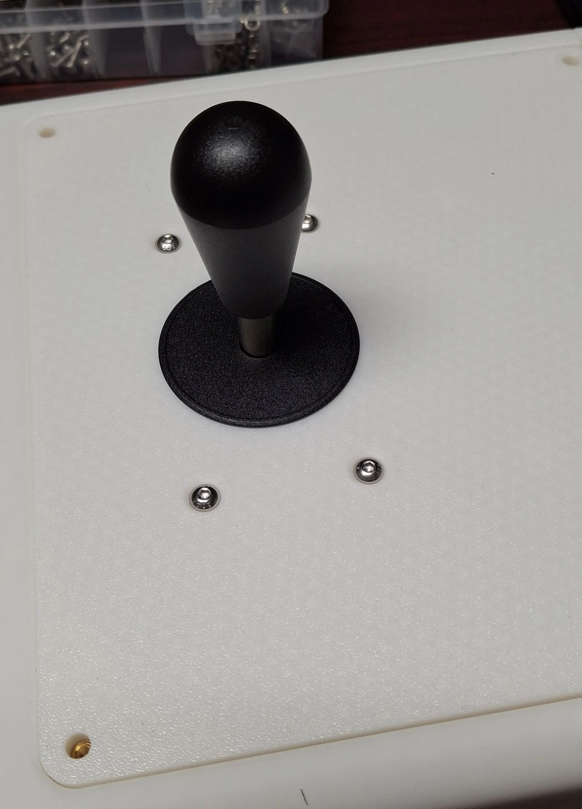 A joystick with a bat topper